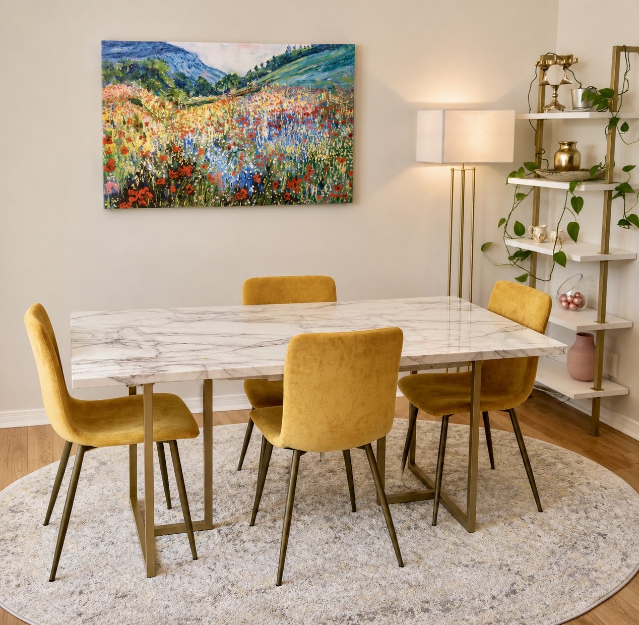 Dining room with yellow chairs, marble-look table and neutral rug
